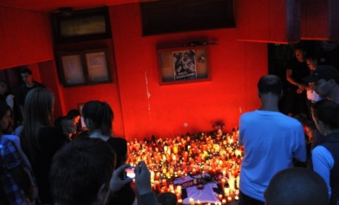 Demitra poster and candles by Slovak hockey fans in TrencÃ­n