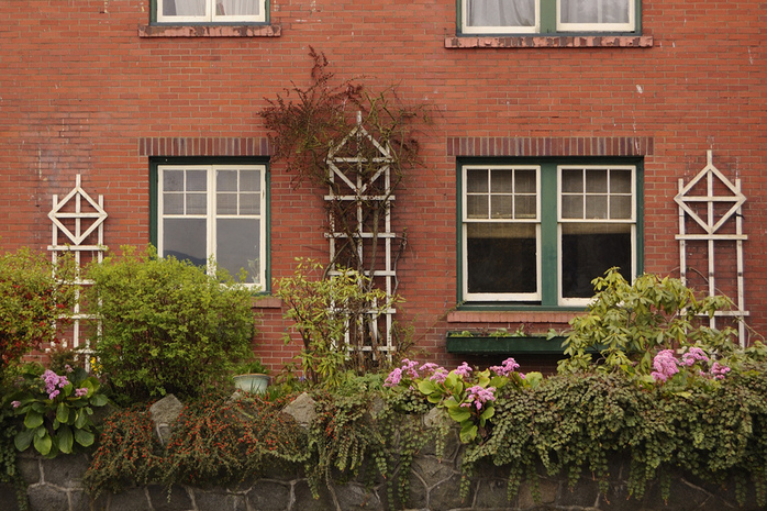 Red brick house with front yard in Kitsilano 