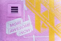 text on colourful wall